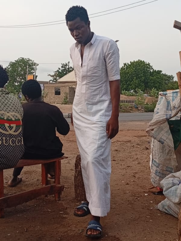 Early morning street life documented in Adankolo, Nigeria