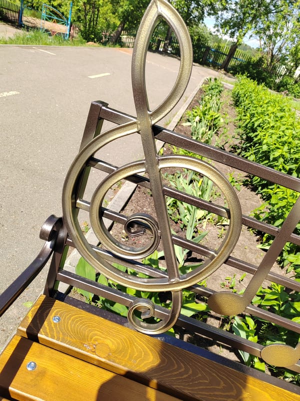 Morning garden scenes with flowers and musical bench observed