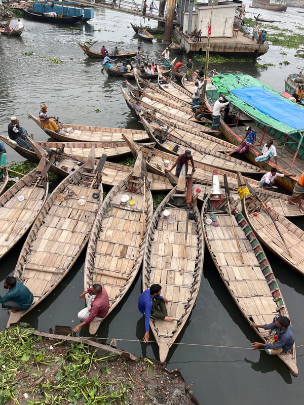 Morning commercial activity scenes documented across Dhaka waterways and streets