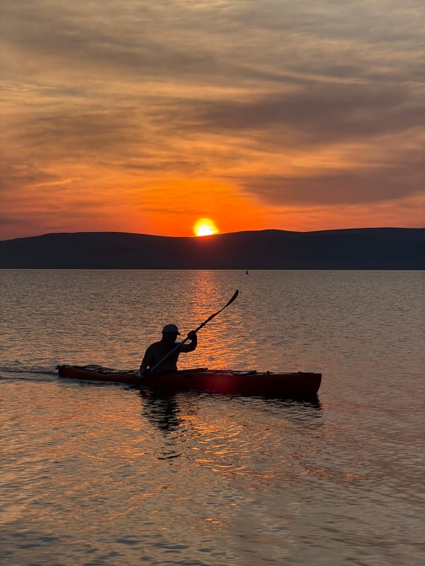 Golden hour sunset over remote Russian waterway