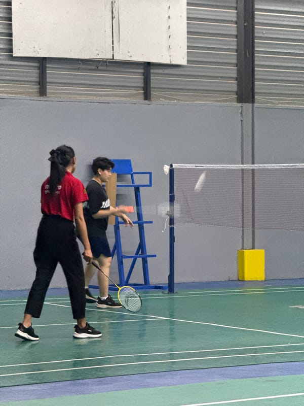 Badminton session at an indoor court in Ko Samui