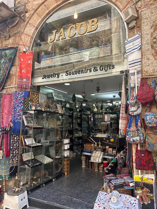 Street-level snapshots of shops and signage in Jerusalem
