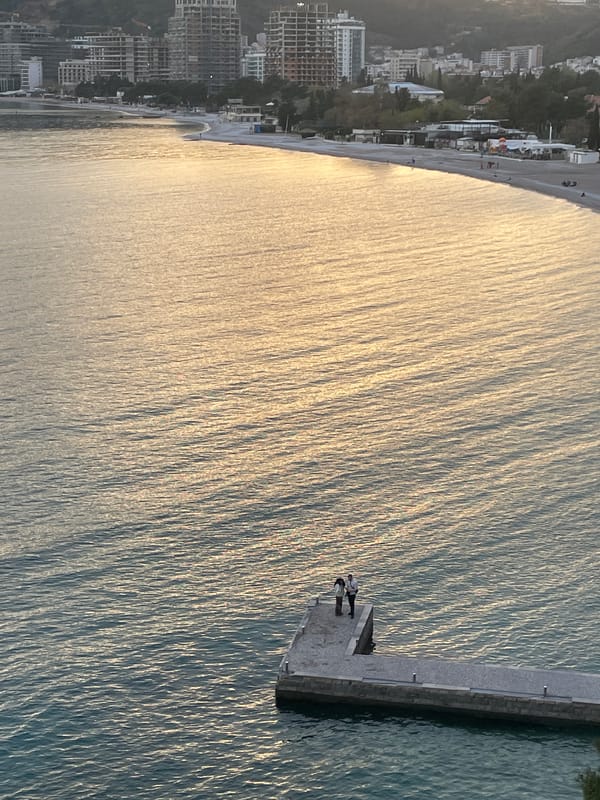 Tourist captures artistic sunset photos at Montenegro beach