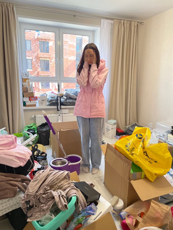 Woman finds comfort with cat in Izhevsk home