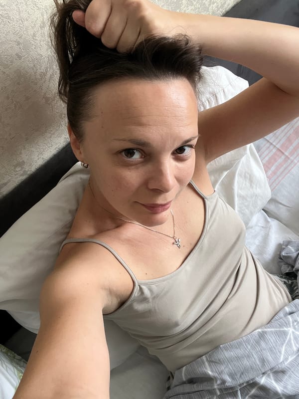 Quiet morning routine in a Tolyatti bedroom, coffee and all