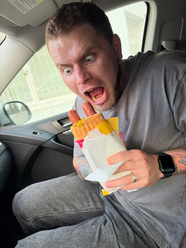 Man eats hot dogs in car in Russia