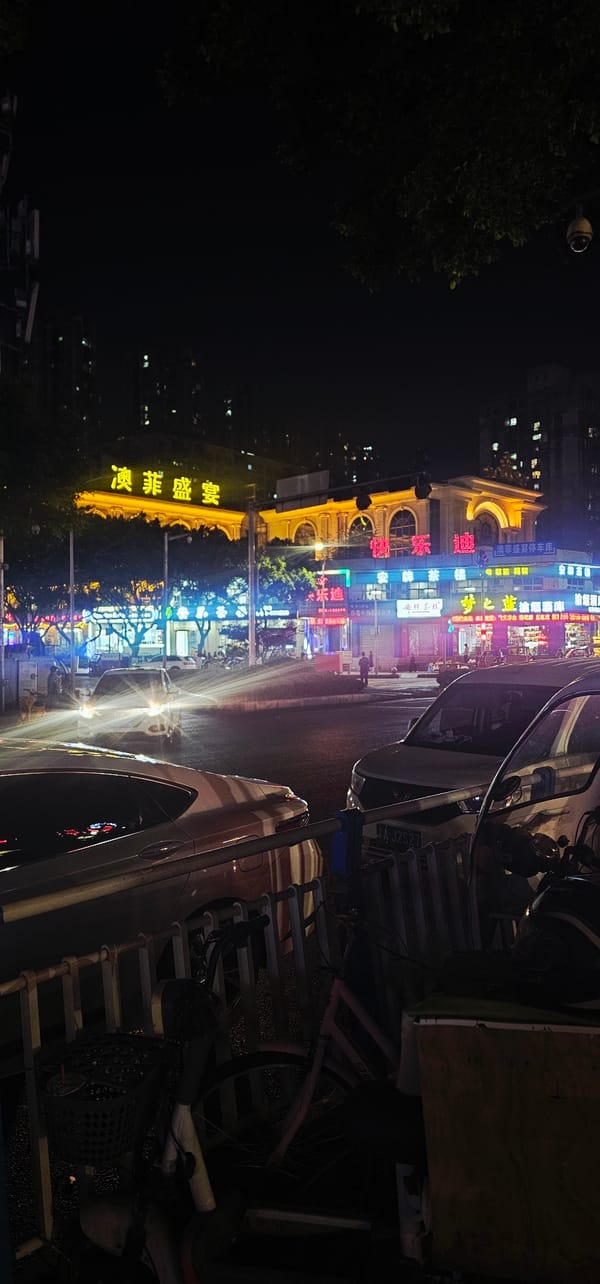 Vibrant nighttime street activity captured in Liangjiang, China