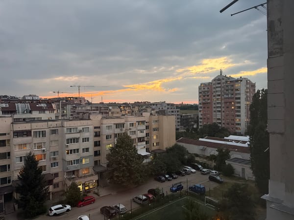 Sofia's socialist-era skyline at golden hour, July dusk