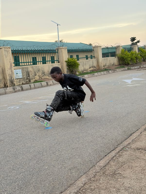 Youth rollerblading and skateboarding captured in Jos, Nigeria