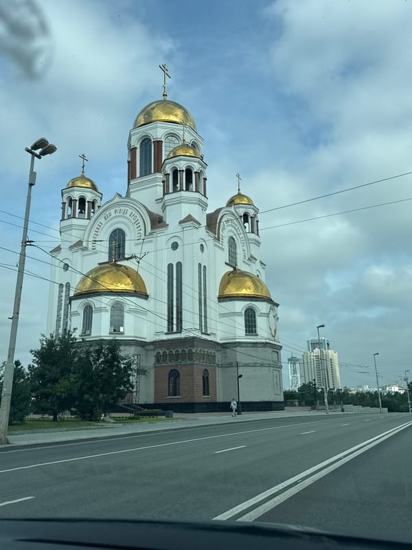 Church on Blood stands under cloudy skies in Yekaterinburg