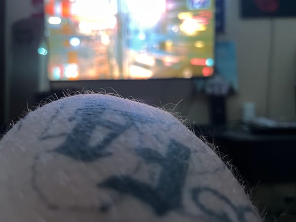 Evening tattoo showcase and gaming session indoors