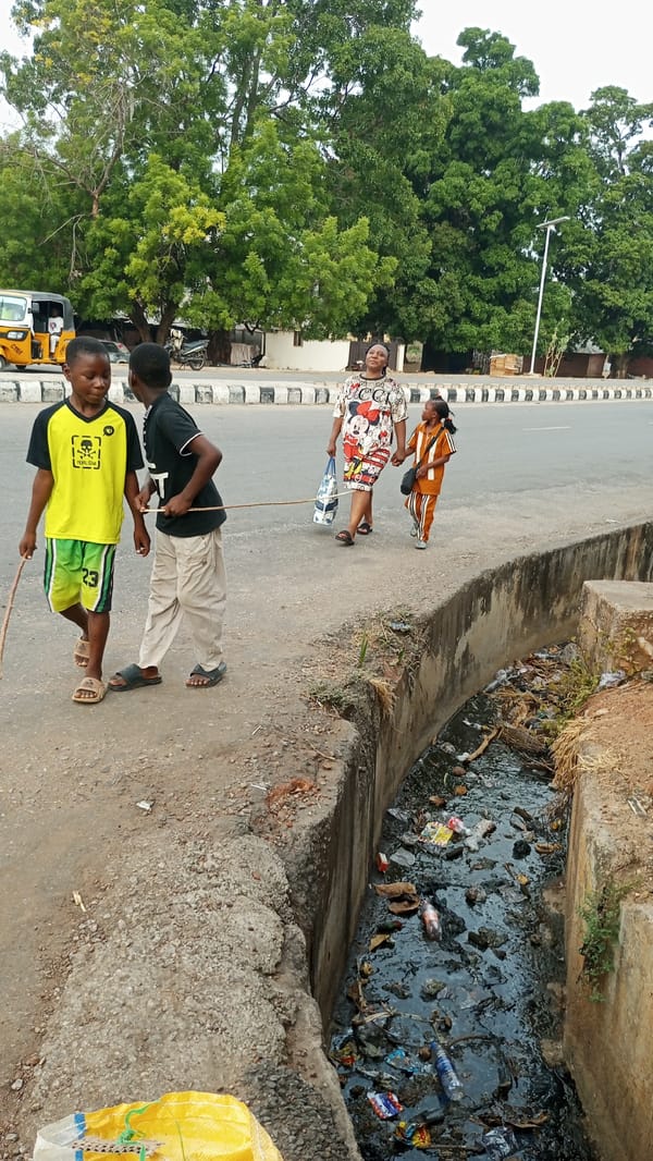 Morning street life documented in Adankolo, Nigeria