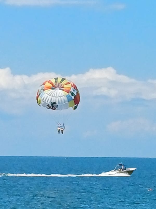 Parasailing and beach activity off the Sochi waterfront