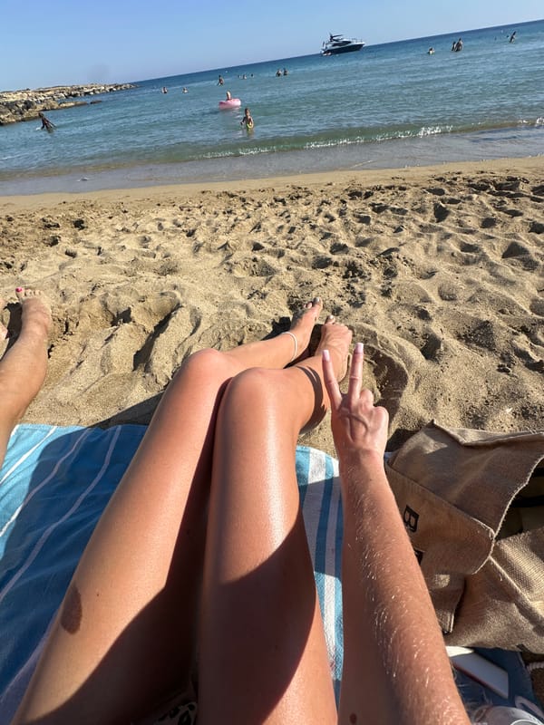 Afternoon at a busy beach in Peyia, Cyprus