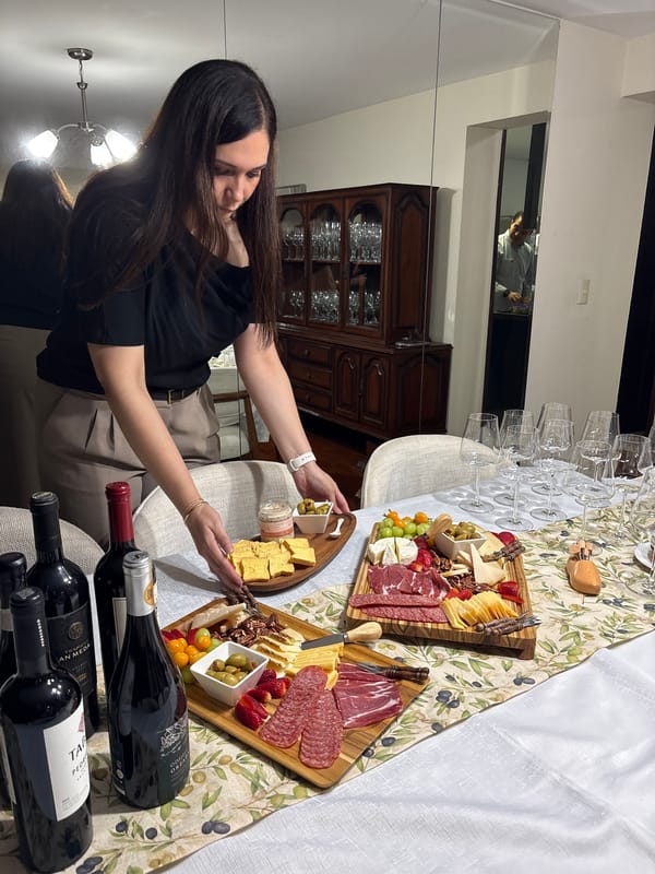 Late-night charcuterie gathering documented in San Isidro, Peru