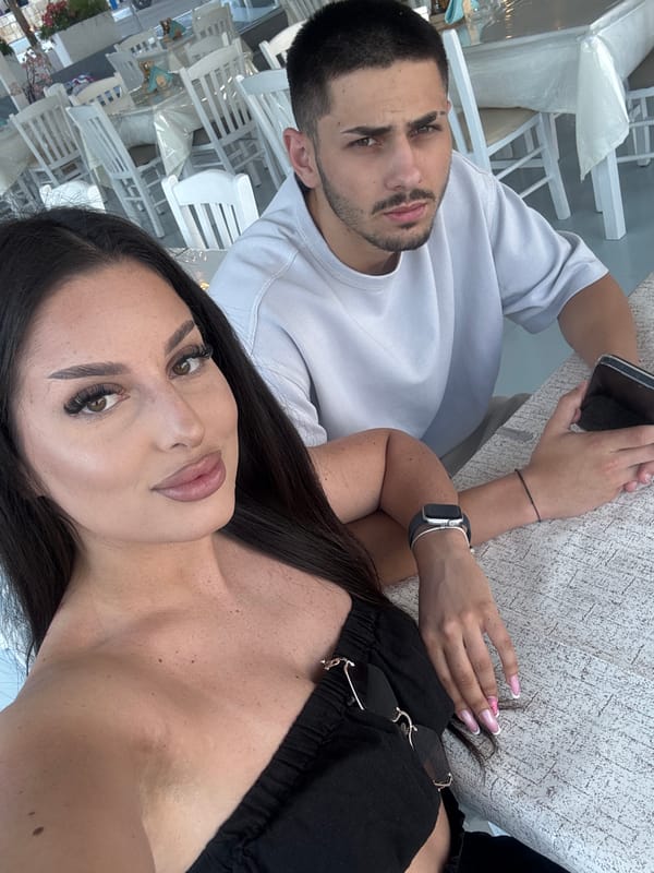 Couple documents dining and beach visit in Apollonioi, Greece