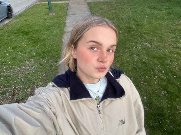 Woman takes selfies in Vancouver early morning