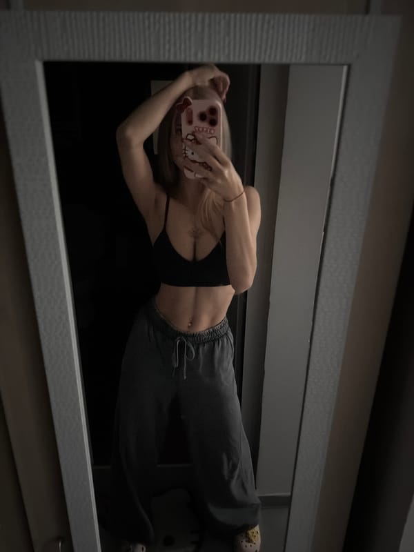 Woman Takes Mirror Selfie in Sofia