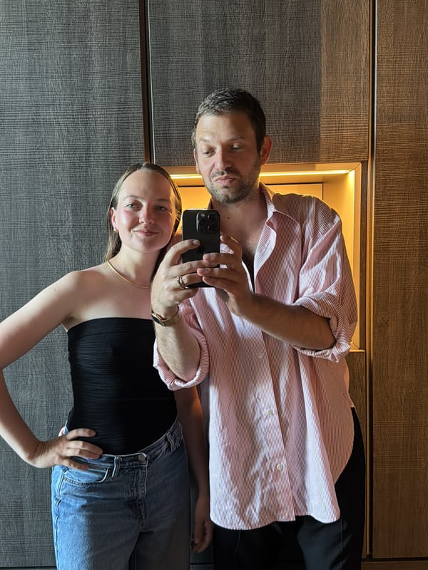 Couple documents lunch date at Asian restaurant in Milan