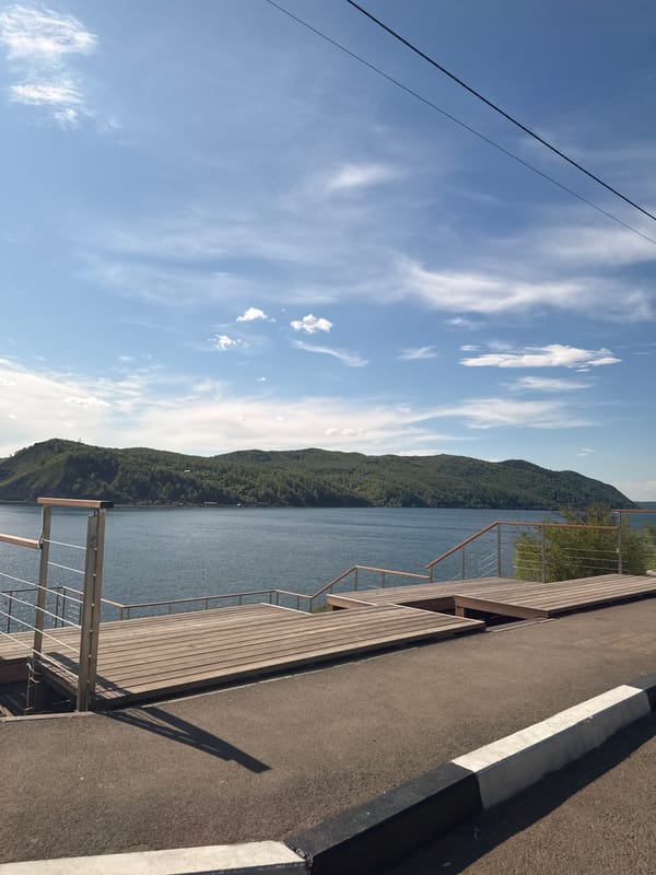 Morning tourists capture scenic Lake Baikal views in Listvyanka