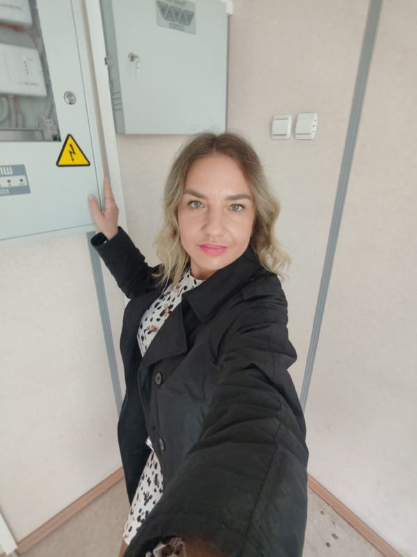 Woman takes selfies in office building, Petropavlovsk-Kamchatsky