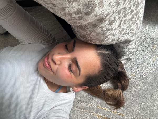 Woman enjoys quiet evening watching Formula 1 at Mexico home