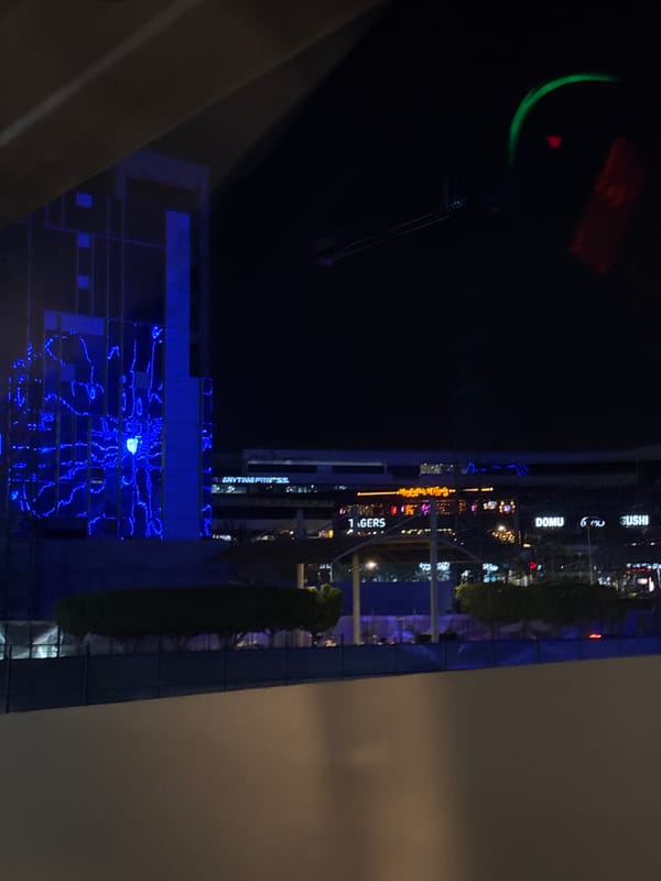 Nighttime commercial district illuminated in Puebla, Mexico