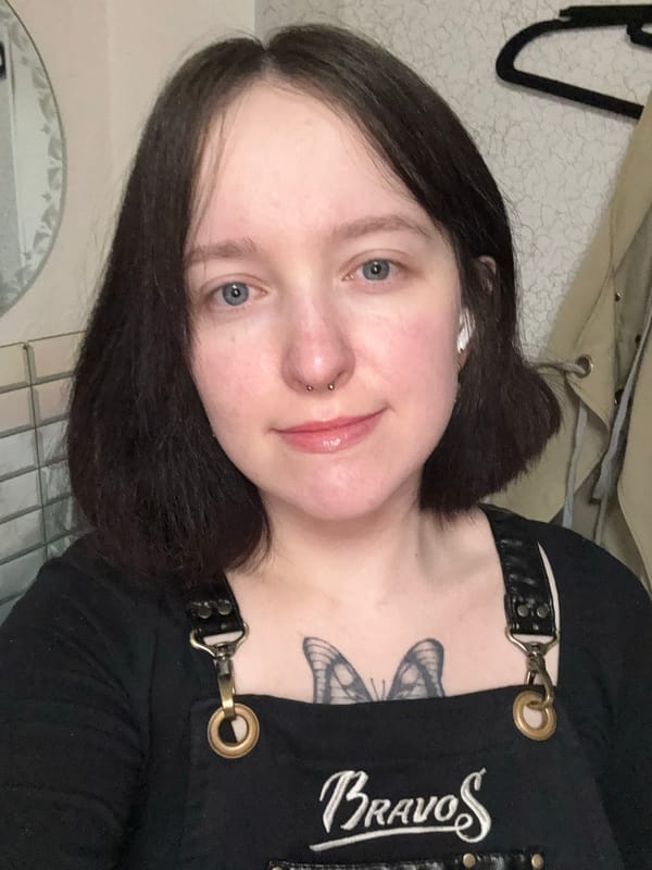 Person with butterfly tattoo takes selfie in Chaikovsky, Russia