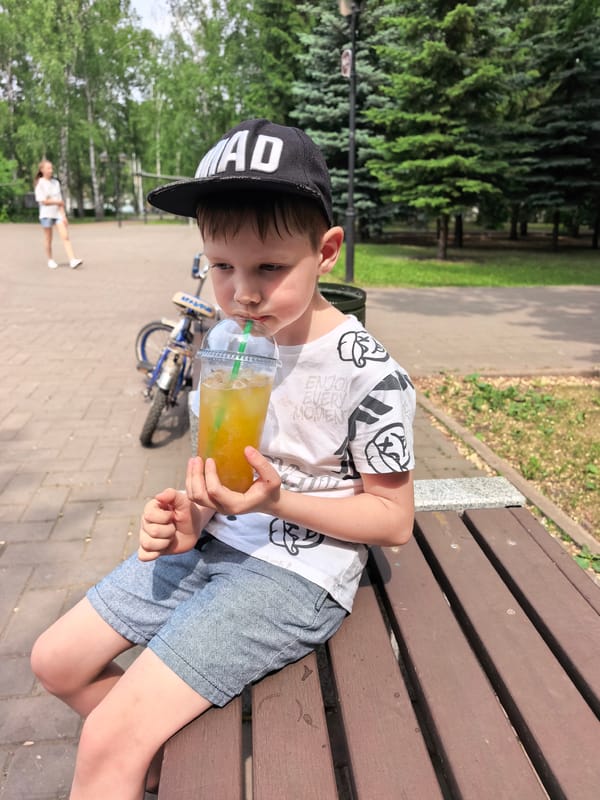 Boy enjoys morning park visit in Sterlitamak, Russia