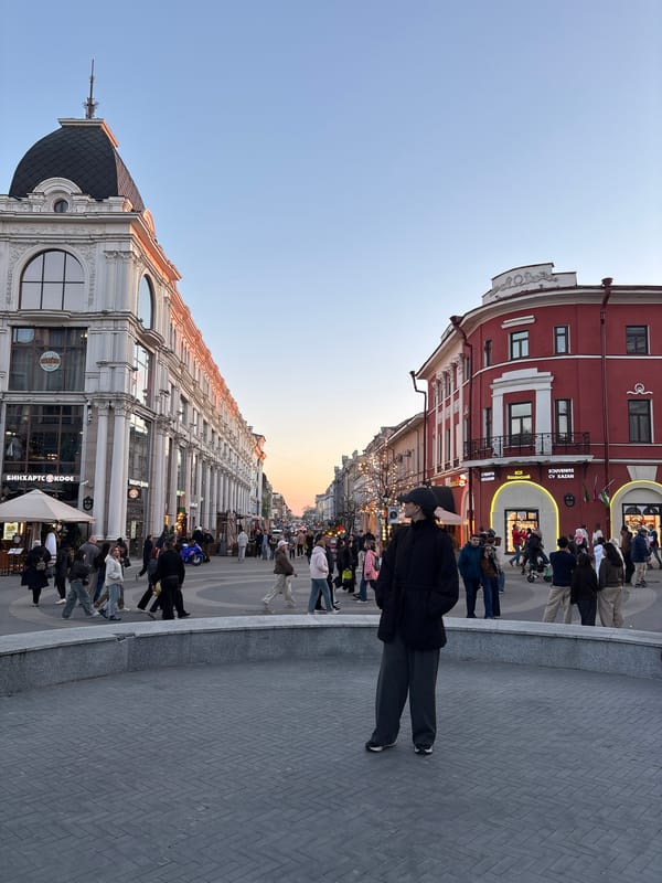 Tourists and locals captured strolling historic Kazan street district