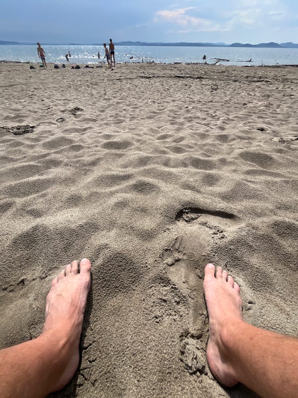 Beach games and swimming on a Siberian lakeshore