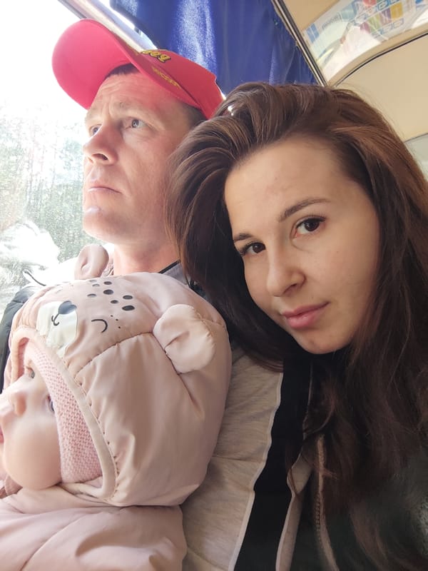 Family with infant travels by public transport in Garevaya