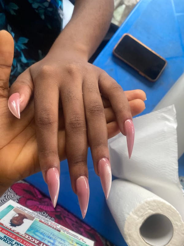 Nail service session documented in Badagry, Nigeria