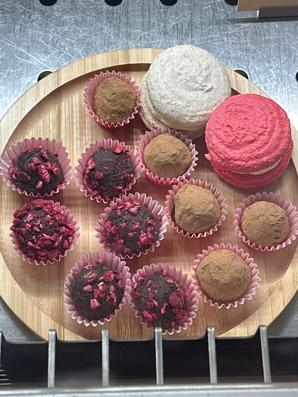 Confectionery display photographed on wooden tray in Novi Sad