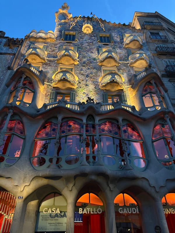 Evening documentation of Gaudí's Casa Batlló facade in Barcelona