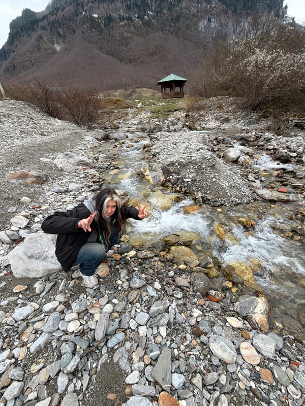 Tourists pose for photos at Montenegro mountain streams