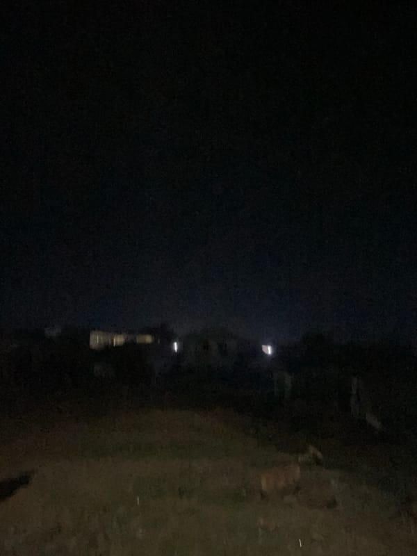 Evening in a Lokoja neighborhood, streets and homes after dark