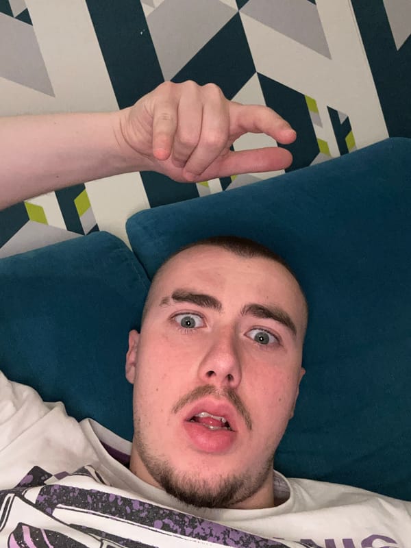 Young man photographed resting on pillow in Sofia