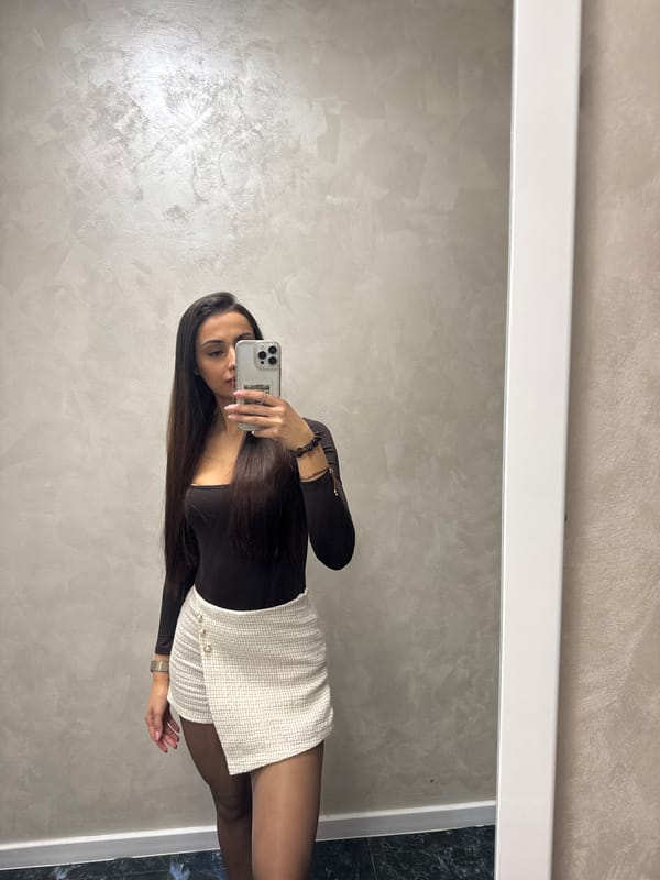 Woman takes mirror selfies indoors in Sofia