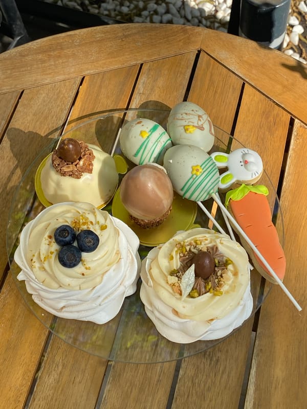 Easter desserts displayed on outdoor table in Novi Sad