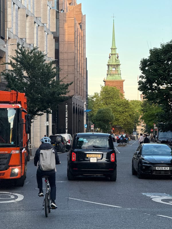 Delivery cyclist makes evening rounds near London restaurants