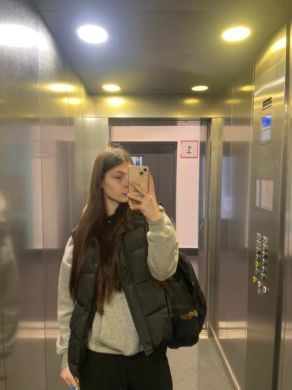 Woman documents evening routine with cat in Saint Petersburg