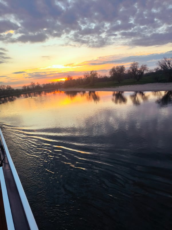 Sunset observed over river in Künzing, Germany