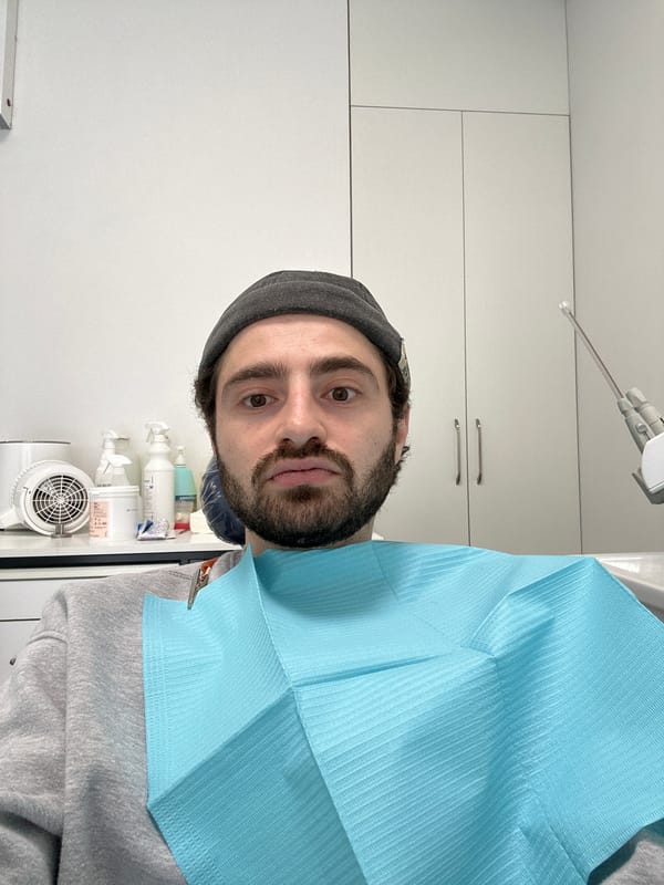 Street musicians perform while dental patient visits clinic in Yerevan