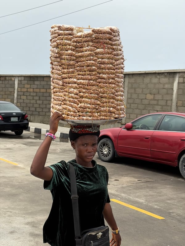 Daily street commerce and transport captured in Igboefon, Nigeria