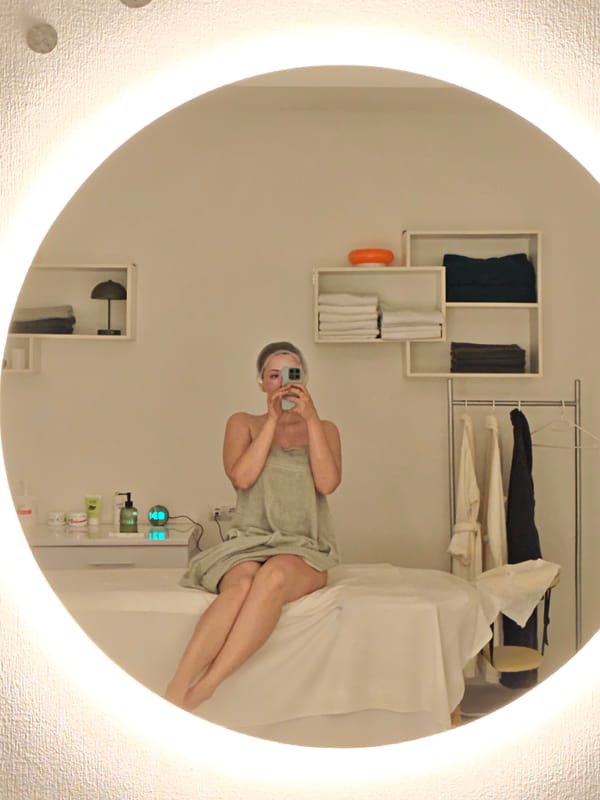 Woman documents spa treatment session in Vinnytsia, Ukraine