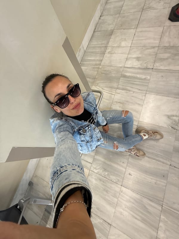 Woman photographed in casual outdoor scenes in Mouzouras, Greece