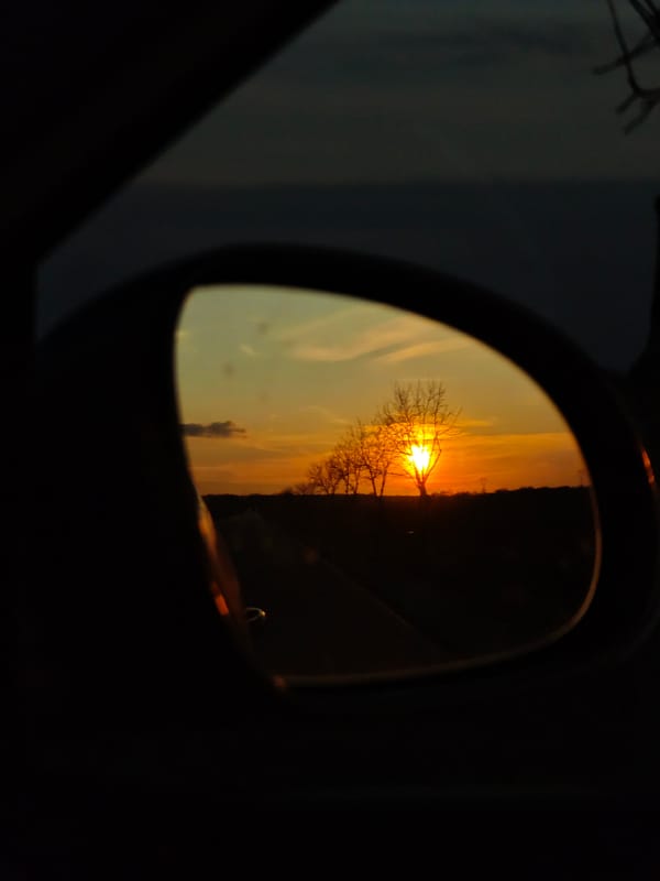 Sunset reflected in car mirror in Vaglen, Bulgaria