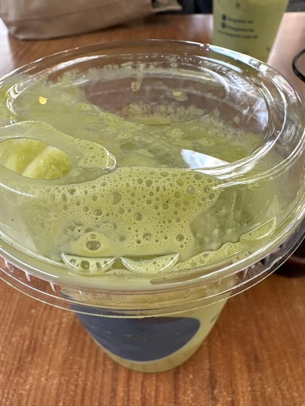 Customer enjoys smoothies and pastries at Mexico City bakery