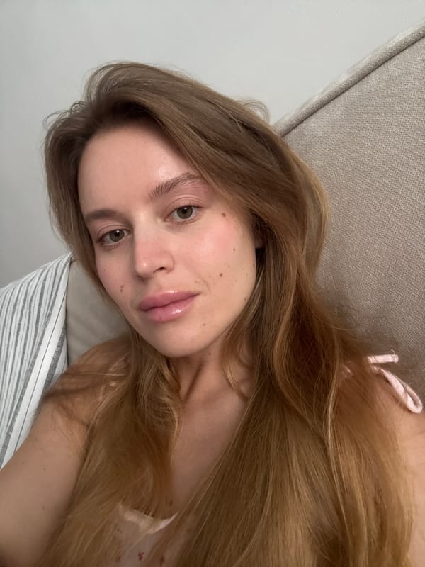 Woman takes indoor selfie portrait in Minsk
